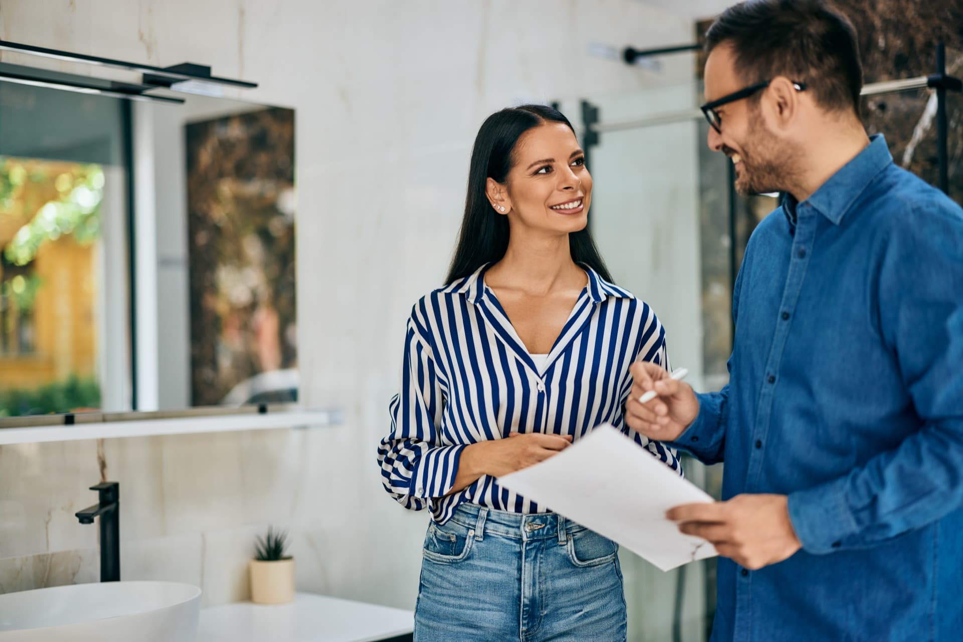 Homeowner and service professional reviewing project details